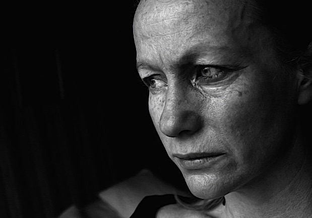 Buddha-Weekly-Depressed Woman mental illness can be helped with meditation-Buddhism According to peer-reviewed research, pain reduction and relief from depression are two major benefits of mindfulness meditation.