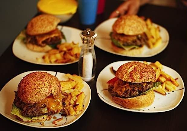 Buddha-Weekly-Hamburgers cost land-Buddhism The hamburger factor. Countless hectares of forest is cleared each year to support the growing popularity of the hamburger.