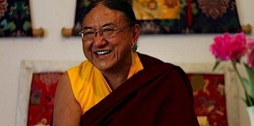 His Holiness Sakya Trizin enjoys a good laugh.
