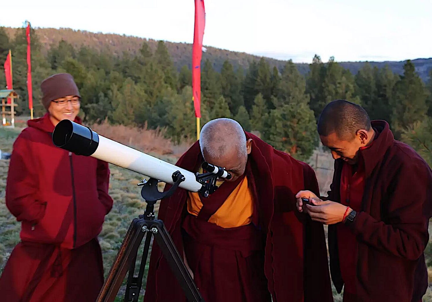 Buddha-Weekly-Lama Zopa Rinpoche gazes through a telescope FPMT-Buddhism Lama Zopa Rinpoche gazes through a telescope. FPMT.